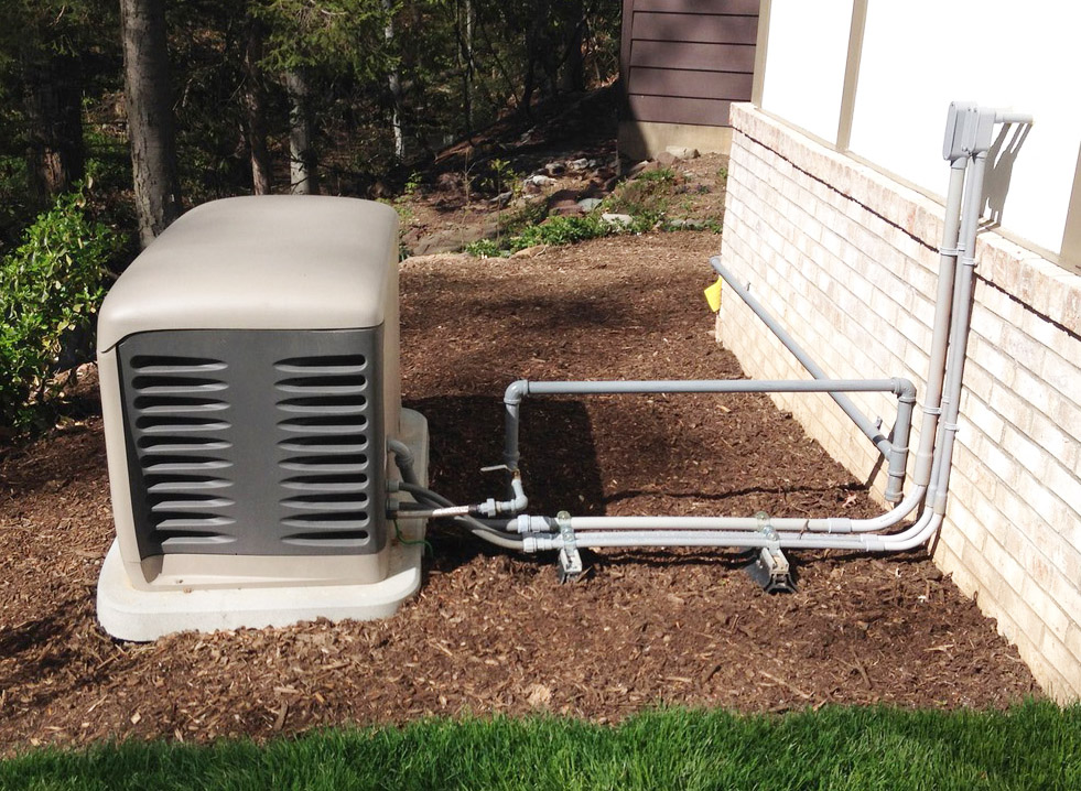 Whole-house automatic standby generator installed beside a North NJ home