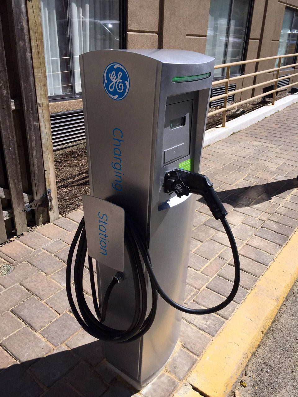 Commercial GE EV charging station pedestal installation